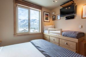 Ένα ή περισσότερα κρεβάτια σε δωμάτιο στο Juniper Springs Lodge # 426