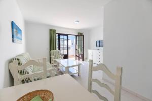 Apartamentos Flamingo的休息区