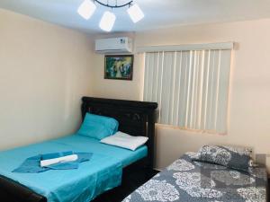 Ένα ή περισσότερα κρεβάτια σε δωμάτιο στο Apartamento Turistico Eisamar