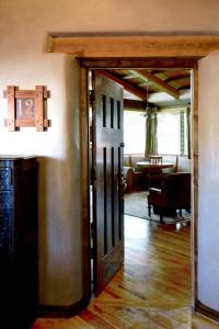 an open door to a room with a living room at El Portal Sedona Hotel in Sedona