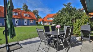 Ein Garten an der Unterkunft Heideröschen Park Heideröschen 5