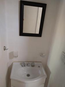 Et badeværelse på El diquecito duplex + 18 billeder