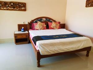Postel nebo postele na pokoji v ubytování Discovery House Hotel SHA Plus