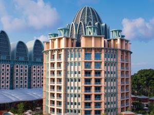 a building with domes on top of it at Resorts World Sentosa - Crockfords Tower in Singapore