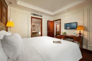 Voodi või voodid majutusasutuse Hanoi Pearl Hotel toas
