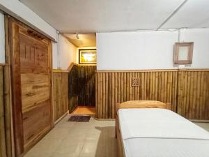Letto o letti in una camera di Backpacker Kawah Ijen