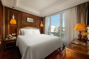 Voodi või voodid majutusasutuse Hanoi Pearl Hotel toas