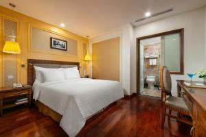 Voodi või voodid majutusasutuse Hanoi Pearl Hotel toas