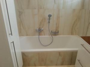 Łazienka w obiekcie PENTHOUSE Griemann 1 mit Infrarotkabine und eigener Dachterrasse für max 4 Personen