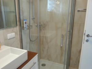 Łazienka w obiekcie PENTHOUSE Griemann 1 mit Infrarotkabine und eigener Dachterrasse für max 4 Personen