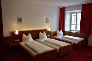 Voodi või voodid majutusasutuse Hotel Krone toas