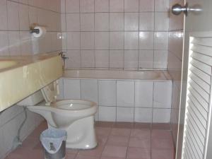 Kylpyhuone majoituspaikassa Uni Hotel
