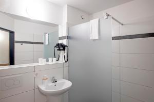 Koupelna v ubytování OEKOTEL Hohenems