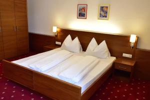 Voodi või voodid majutusasutuse Hotel Krone toas