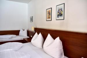 Voodi või voodid majutusasutuse Hotel Krone toas