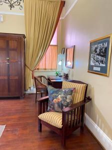 A seating area at Kimberley Club Guesthouse