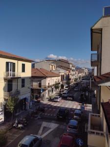 a view of a city street with cars parked at Mazzini Affittacamere in Viareggio