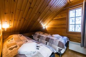 Ein Bett oder Betten in einem Zimmer der Unterkunft Riekko Chalet