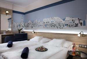 Posteľ alebo postele v izbe v ubytovaní Hotel Irottkö