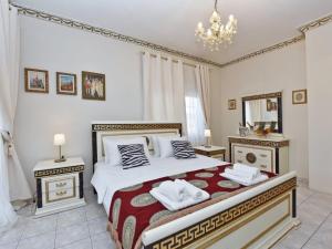 Posteľ alebo postele v izbe v ubytovaní Royal House