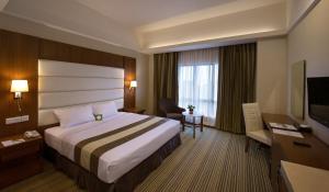 Postel nebo postele na pokoji v ubytování Pearl View Hotel Prai, Penang