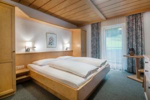 Voodi või voodid majutusasutuse Apartpension Kappacher toas