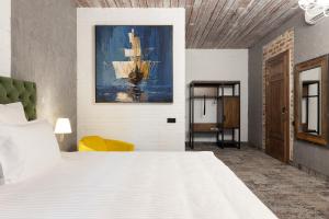 Кровать или кровати в номере BUSEL Бутик-отель