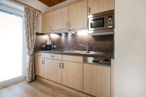 Köök või kööginurk majutusasutuses Apartpension Kappacher