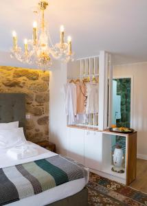 Giường trong phòng chung tại Casa da Ana Boutique Guest House