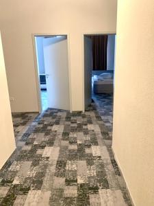 Postel nebo postele na pokoji v ubytování Albert Hotel
