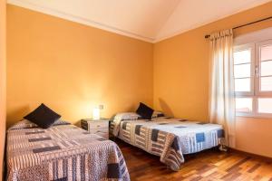 Posteľ alebo postele v izbe v ubytovaní Duplex Pedroza