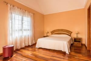 Säng eller sängar i ett rum på Duplex Pedroza