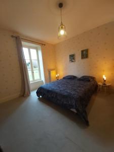 Le Gîte de l Andarge客房内的一张或多张床位