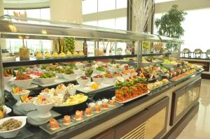 a buffet line with many different types of food at Crowne Plaza Istanbul Asia, an IHG Hotel in Istanbul