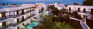 an aerial view of a building with a swimming pool at Hersonissos Maris in Hersonissos