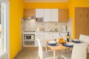Kuchyň nebo kuchyňský kout v ubytování Apartment Gloria Premium + 26 fotografií