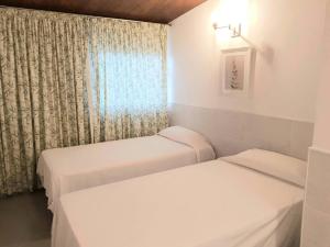 Ein Bett oder Betten in einem Zimmer der Unterkunft Tarajalejo Eco Ocean B
