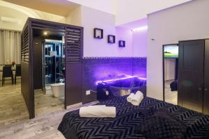 Posteľ alebo postele v izbe v ubytovaní Sicily Suite
