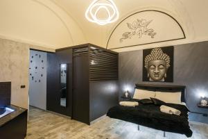 Posteľ alebo postele v izbe v ubytovaní Sicily Suite