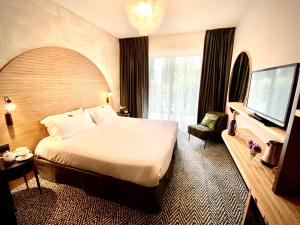 Кровать или кровати в номере GOLF HOTEL