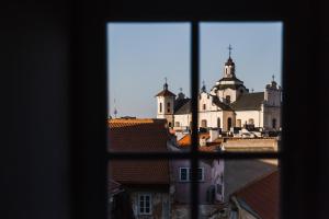 a view of a city from a window at #stayhere - Modern Luxury Apartments in the Heart of Old Town Vilnius in Vilnius