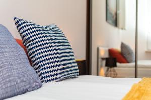 Łóżko lub łóżka w pokoju w obiekcie Wilcza 26A by Homeprime