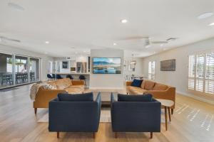 a large living room with couches and chairs at The Estate at Gold Dust in Scottsdale