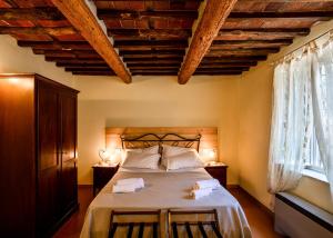 Posteľ alebo postele v izbe v ubytovaní Agriturismo Tenuta Adamo + 37 fotografií