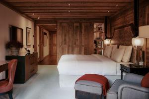 Letto o letti in una camera di The Alpina Gstaad