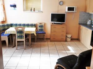 Kuchyň nebo kuchyňský kout v ubytování Apartment Robert