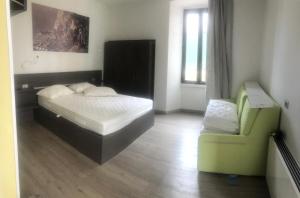 Postel nebo postele na pokoji v ubytování Antica Campione Rooms & Hostel