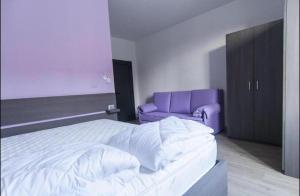 Postel nebo postele na pokoji v ubytování Antica Campione Rooms & Hostel