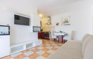 Televízia a/alebo spoločenská miestnosť v ubytovaní Apartment Terra Magica in Istria + 20 fotografií