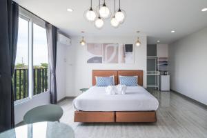 Postel nebo postele na pokoji v ubytování Tree Tara hotel + 37 fotografií